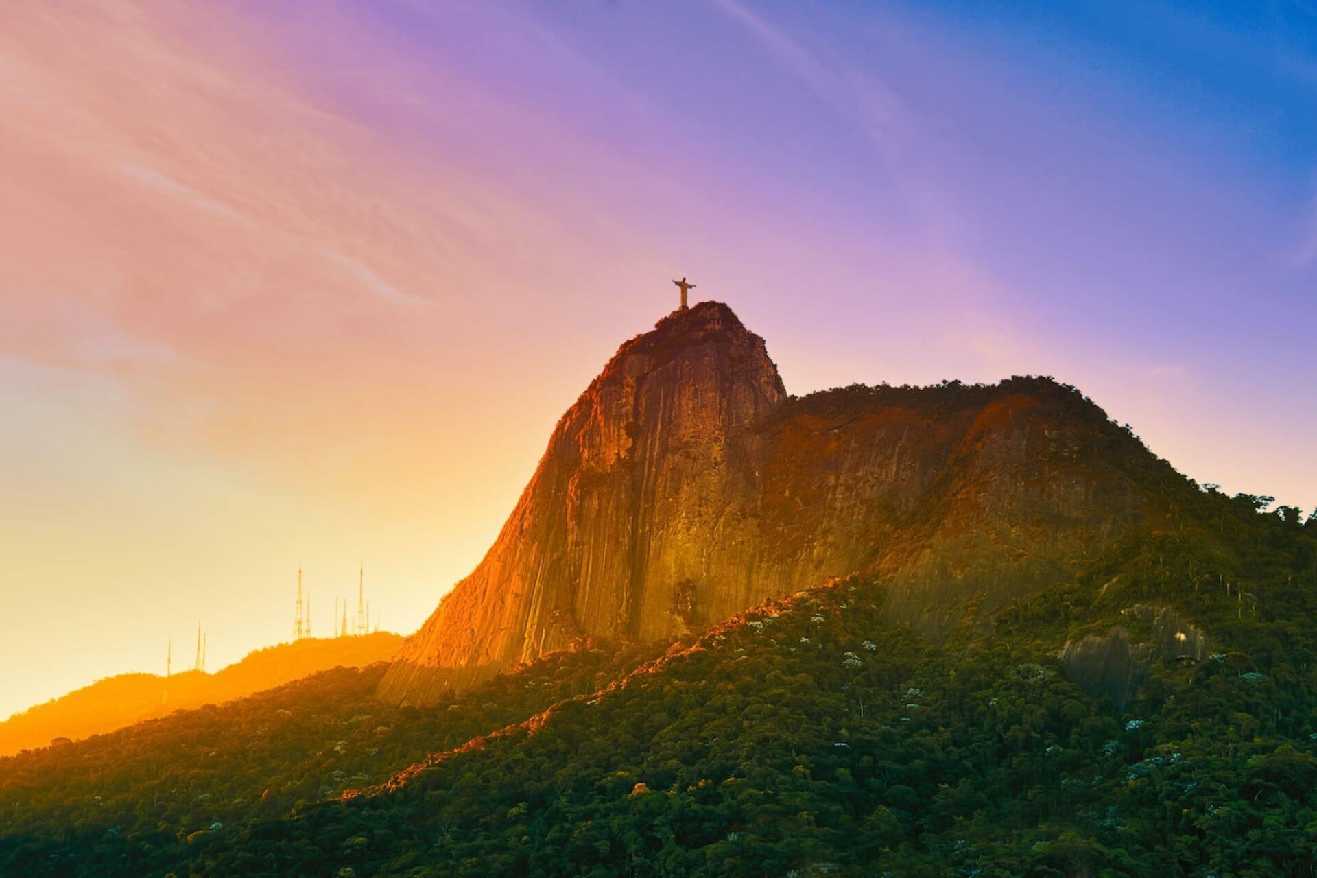 View of the Christ the Saviour statue on top of a mountain in Rio de Janeiro
