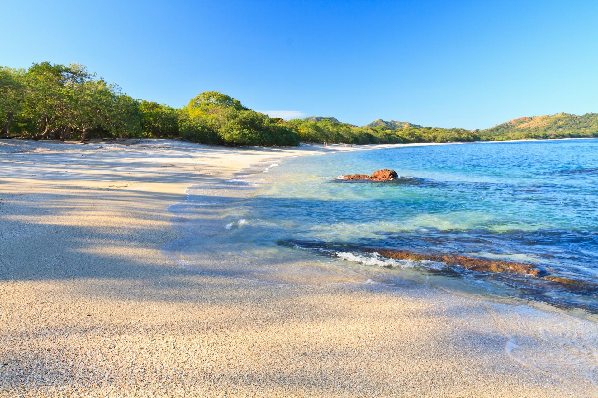 Awesome beach and lake in Playa Conchal on a clear sky day