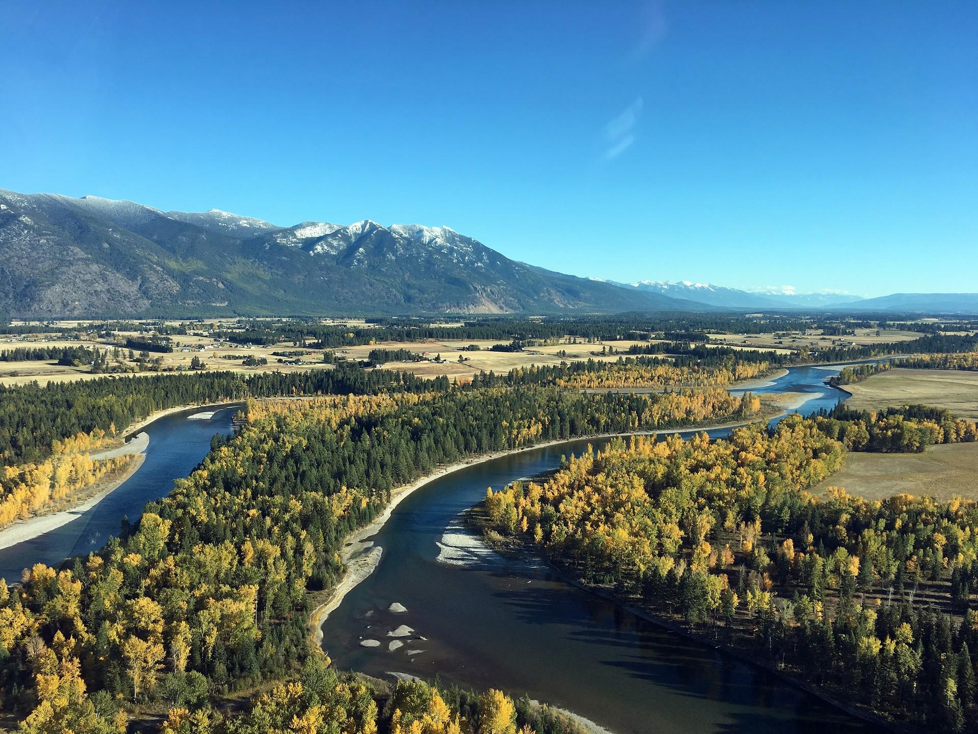 Aerial view of mountain range near Kalispell on a clear sky day