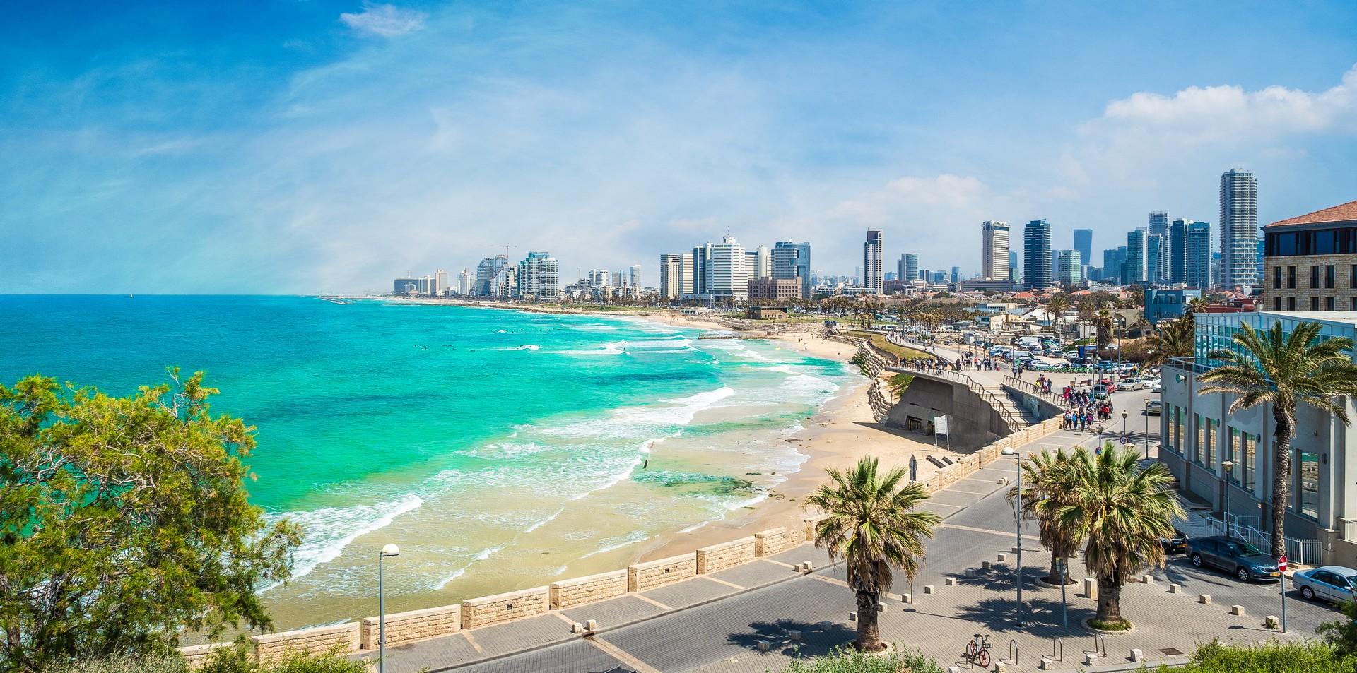Beach with turquise sea in Tel Aviv-Yafo in partly cloudy weather