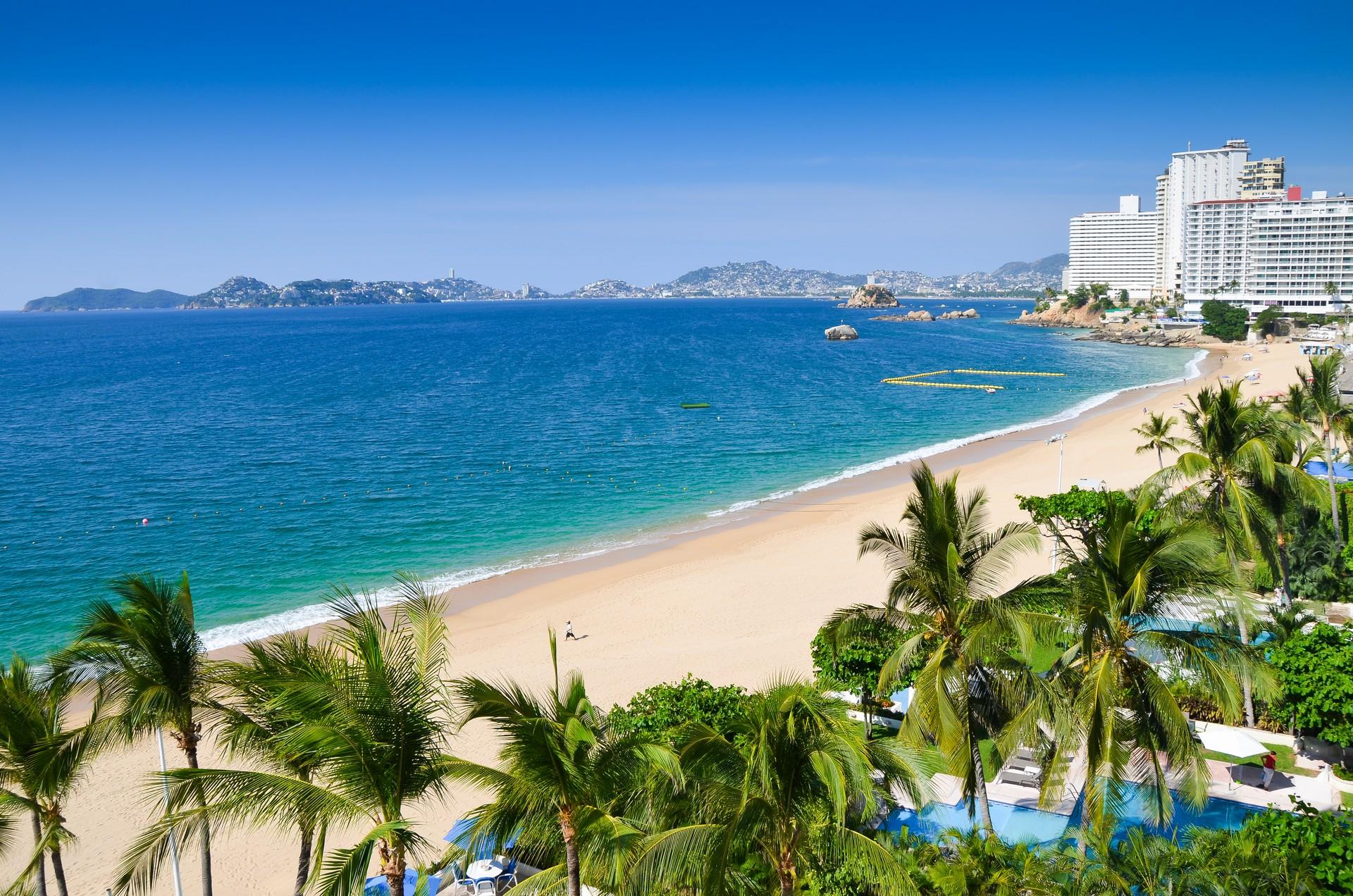 Enjoyable beach in Acapulco with nice weather and blue sky
